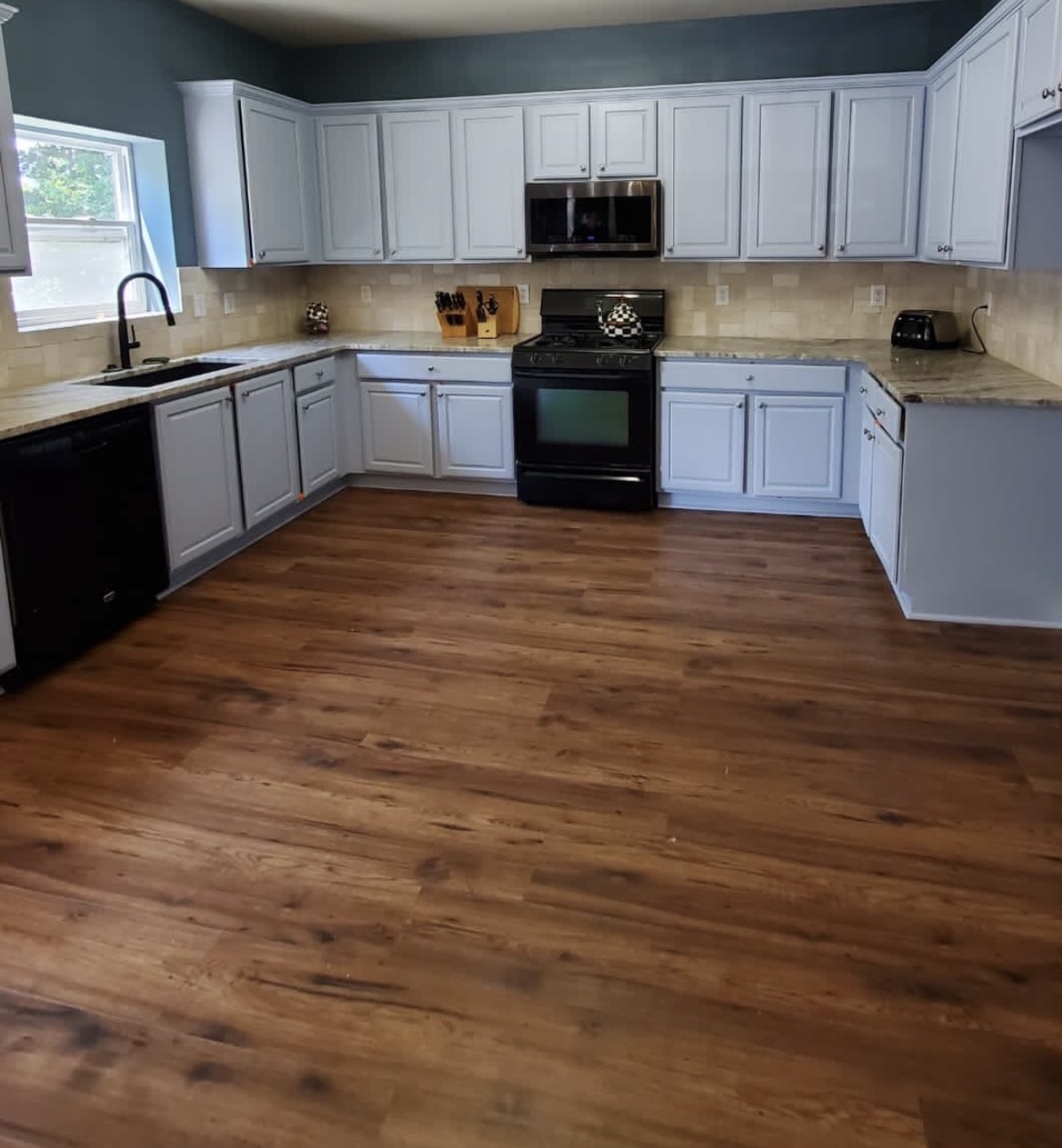 Oak kitchen masked and sprayed soft white — after