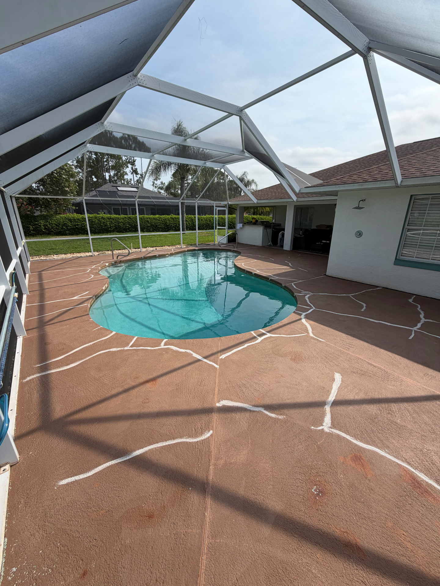 Pool Deck Restoration — Cracked Concrete to Fresh White before